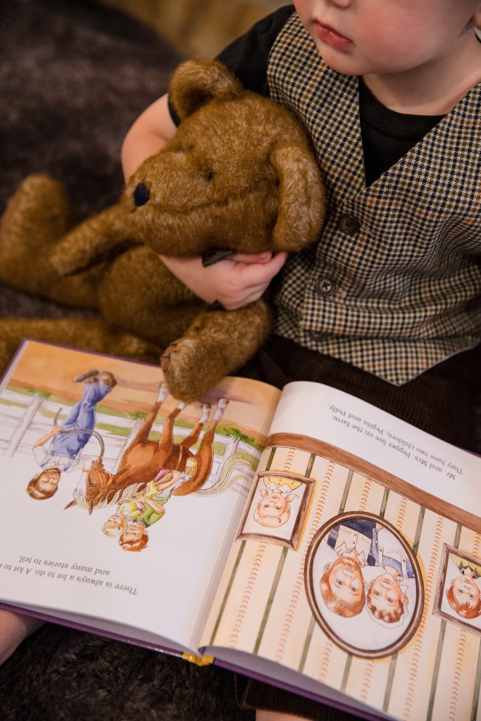 Bear and Boy holding a book